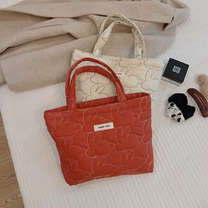 Quilted tote bag with rabbit pattern and cotton padded handle for daily use