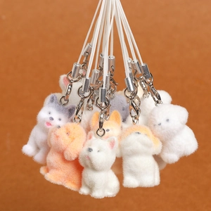 Cute resin flocked puppy charms in white, grey, and orange for bags and phone cases