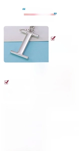 Close-up of polished silver zinc alloy letter keychains with eco-friendly plating finish