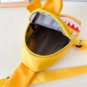 Yellow cartoon shark chest bag for kids showing inner compartment on white background