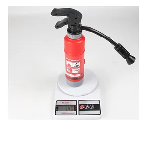 Detail of red fire extinguisher water toy on a digital scale showing product weight