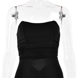 Detailed close-up of the black strapless dress featuring elegant pleated texture and ruching