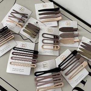 Brown seamless hair clips set in Morandi tones with matte drop and wave shapes