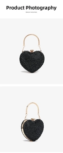 Detail of heart-shaped rhinestone evening bag with gold ring handle and metal clasp
