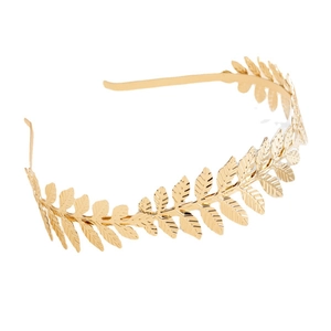 Elegant golden metal leaf headband with minimalist branch design on white background