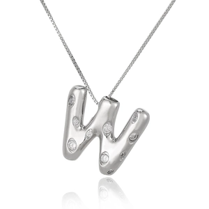 Detail of silver letter W pendant with micro-paved cubic zirconia on a box chain