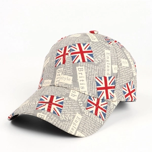 Detailed view of grey baseball cap featuring Union Jack graffiti and British style typography