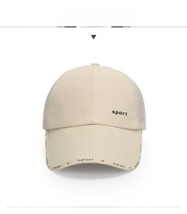 Detail view of khaki baseball cap featuring breathable mesh panels and sport logo branding