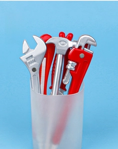 Creative hardware tool ballpoint pens with 0.5mm tips stored in a modern desk holder