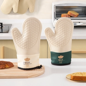 Thick heat-resistant silicone oven mitts with beige and dark green quilted fabric cuffs