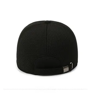 Rear view of black wool baseball cap showing adjustable metal buckle and twill texture