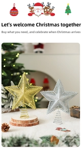 Close-up of sparkling gold and silver star tree toppers with spiral bases on faux snow