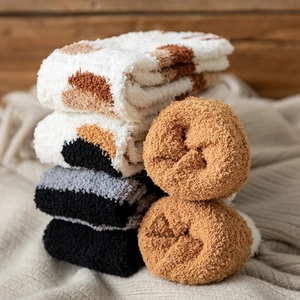 Thick coral fleece socks for women featuring cozy cat paw designs and warm striped textures