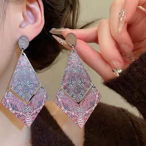 Ethnic rhombus pendant earrings with vintage floral print and dark wood accent
