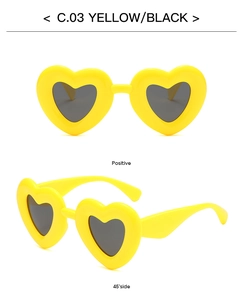Detailed views of yellow heart-shaped sunglasses with dark polarized lenses and glossy finish