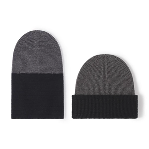 Two-tone knitted beanie in charcoal and black showing flat and cuffed styles