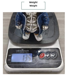 Weight measurement of creative resin skeleton figure in blue hoodie for Halloween decor