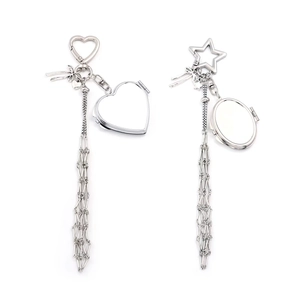 Detail of silver lipstick chain pendants with heart and star clasps and metal tassels