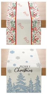 Detail of Christmas table runners with festive patterns on wood background