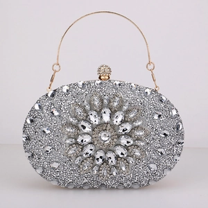 Silver rhinestone evening clutch bag with crystal flower pattern and gold handle