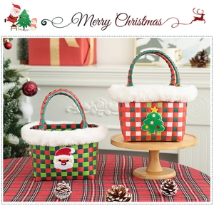 Detail of Christmas woven baskets with Santa patch and faux fur trim for festive gifts