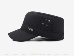 Detail view of the black cadet hat featuring metal rivets and Jeans brand plaque