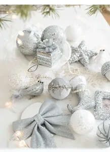 Silver and white Christmas ornament set with glitter stars and velvet socks