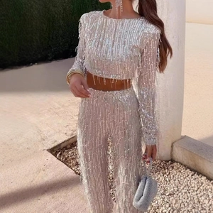 Sparkling silver sequin fringe two-piece set with cropped long sleeve top and wide leg pants