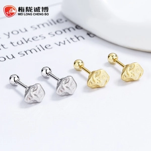 Detailed macro view of 925 sterling silver cherry stud earrings with screw ball backing