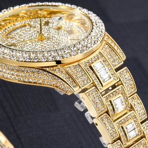 Macro side view of luxury gold watch with full diamond setting and quartz movement