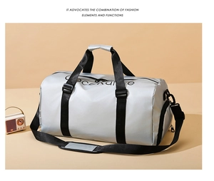 Silver-grey cylinder gym bag with adjustable shoulder strap and side zipper pocket