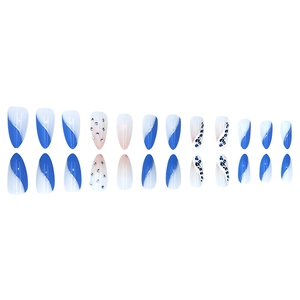 Blue and leopard print stiletto press-on nails with silver glitter and rhinestones