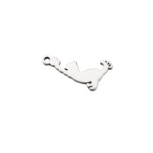 Detailed view of a polished stainless steel dinosaur charm pendant for DIY jewelry making