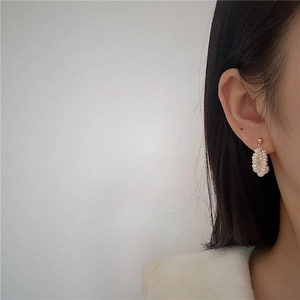 Elegant multi-layer natural freshwater pearl earrings in gold for a vintage palace look