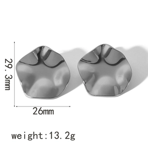 Detailed view of geometric wavy pentagon earrings with size and weight measurements
