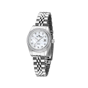 Macro detail of silver quartz watch with mother of pearl dial and crystal bezel