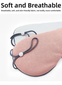 Detail of blue and pink breathable cotton sleep masks with adjustable grey elastic straps
