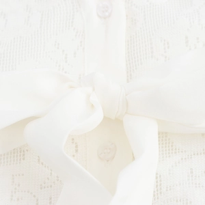 Elegantes französisches Jacquard-Kleid mit V-Ausschnitt, weißer Schleife und Knopfdetails