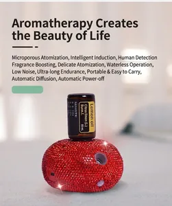 Macro view of smart red rhinestone diffuser with USB-C port and 15ml essential oil bottle
