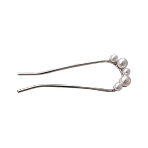 Elegant U-shaped hair pin with five white pearls on a polished silver metal base