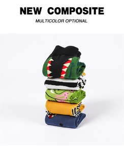 Detailed stack of five pairs of colorful cartoon monster socks on white background