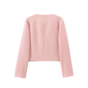 Rear view of pink tweed cropped jacket featuring textured fabric and long sleeves