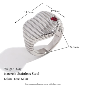 Detail view of steel color stainless steel ring with red stone and dimensions info