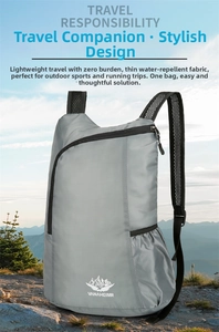 Close-up of light gray lightweight folding backpack with waterproof fabric in mountain landscape