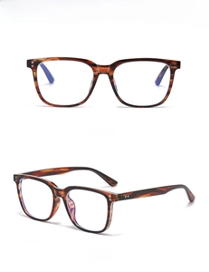 Macro detail of tortoiseshell square frame glasses with anti-blue light lenses