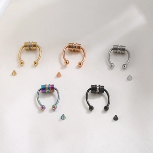Magnetic horseshoe nose ring set in five colors with interchangeable spike and ball ends