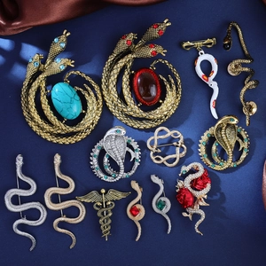 Vintage snake brooch set with enamel and rhinestones for suits and accessories