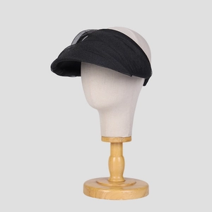 Detail of breathable black organza sun hat with wide brim on mannequin head