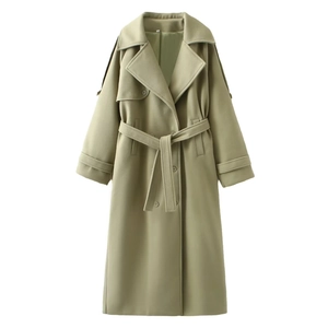 Long sage green woolen coat with wide lapels and waist belt on a white background