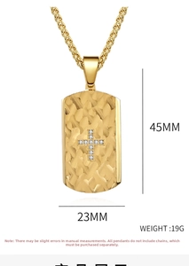 Macro detail of gold military tag pendant featuring cross diamonds and dimensions 45mm x 23mm